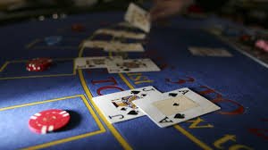 handicap parlay mobile app interface showing live-dealer tables and sportsbook betting options